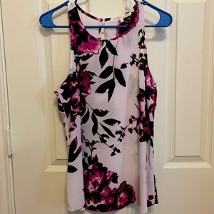 Sleeveless large print floral blouse
